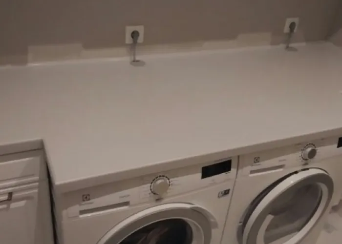 Столешница из искусственного камня Corian Pearl Grey в постирочную