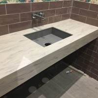 Изделие для ванной из искусственного камня Grandex M710 с "литой" мойкой Изделие для ванной из искусственного камня Grandex M710 с "литой" мойкой