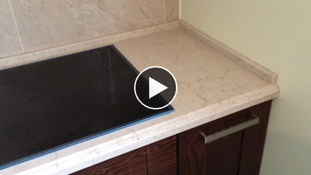 Видеообзор: Столешница из кварцевого агломерата Caeserstone 5212 taj royale: фигурная кромка, остров.